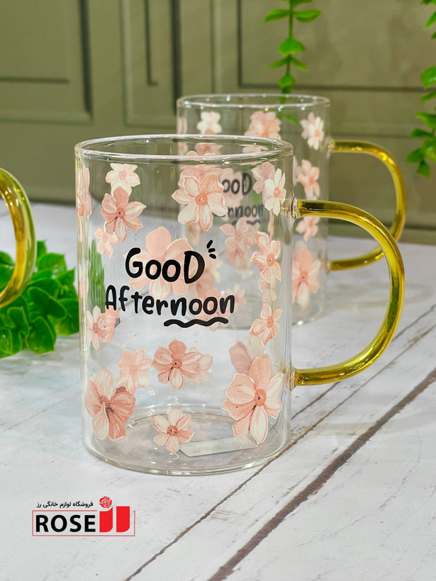 ماگ پیرکس دسته رنگی طرح گل صورتیgood afternoon